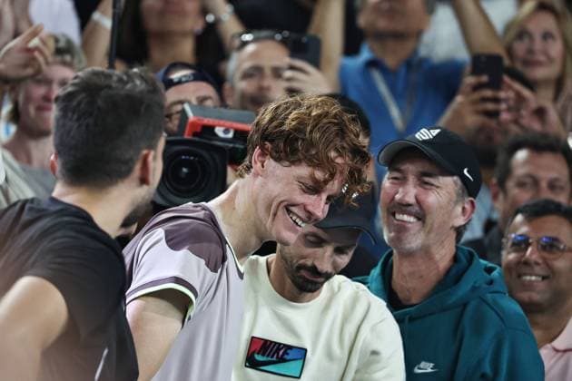 Jannik Sinner, ITA, celebrating with his team after final of 2024 Australian Open in Melbourne, 28 01 2023; -