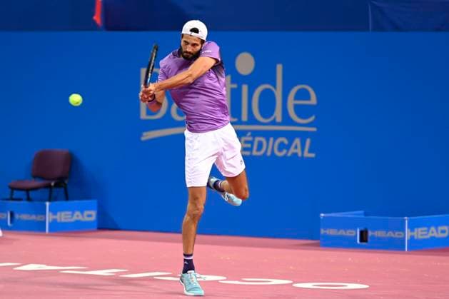 MONTPELLIER, FRANCE - JANUARY 29 : Titouan DROGUET (FRA) during the qualifiers of the ATP, Tennis Herren 250 Open Sud de France tournament in Montpellier, France on January 29th, 2024. TENNIS : Open Sud de France ATP 250 - 29 01 2024 ValentinaClaret Panoramic 