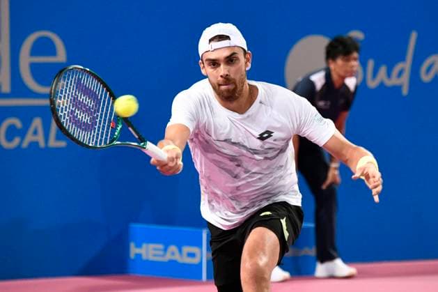 MONTPELLIER, FRANCE - JANUARY 29 : Benjamin BONZI (FRA) during the 1st round of the ATP, Tennis Herren 250 Open Sud de France tournament in Montpellier, France on January 29th, 2024. TENNIS : Open Sud de France ATP 250 - 29 01 2024 ValentinaClaret Panoramic 