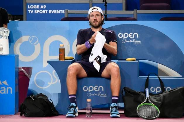 MONTPELLIER, FRANCE - JANUARY 30 : Lucas POUILLE (FRA) during the 1st round of the ATP, Tennis Herren 250 Open Sud de France tournament vs. Harold MAYOT (FRA) in Montpellier, France on January 30th, 2024. TENNIS : Open Sud de France ATP 250 - 30 01 2024 ValentinaClaret Panoramic 
