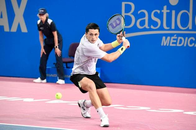 MONTPELLIER, FRANCE - JANUARY 30 : Harold MAYOT (FRA) during the 1st round of the ATP, Tennis Herren 250 Open Sud de France tournament vs. Lucas POUILLE (FRA) in Montpellier, France on January 30th, 2024. TENNIS : Open Sud de France ATP 250 - 30 01 2024 ValentinaClaret Panoramic 