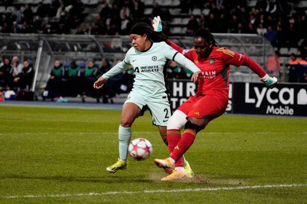 Chiamaka Nnadozie of Paris FC clears from Mia Fishel of Chelsea Paris FC Feminines v Chelsea Women, Football, UEFA Women s Champions League, Group D, Stade Charlety, Paris, France - 30 Jan 2024 EDITORIAL USE ONLY No use with unauthorised audio, video, data, fixture lists, club league logos or live services. Online in-match use limited to 120 images, no video emulation. No use in betting, games or single club league player publications. Copyright: xDavexWinter Shutterstockx 14324140ad