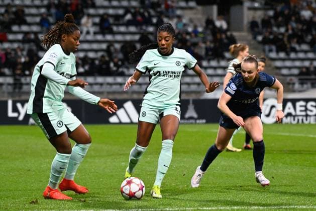Ashley Lawrence ( 12 - Chelsea ) - Kadeisha Buchanan ( 26 - Chelsea ) and Julie Dufour ( 11 - PFC ) during the UEFA Women s Champions League match between PFC and Chelsea at Stade Charlety on January 30, 2024 in Paris, France. ( Photo by federico pestellini panoramic ) - FOOTBALL : PFC vs Chelsea - Ligue des Champions Feminine - 30 01 2024 FedericoPestellini Panoramic 