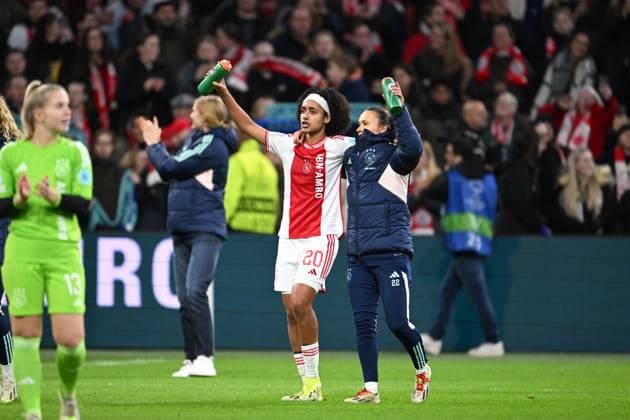 AMSTERDAM - (l-r) Lily Yohannes of Ajax, Quinty Sabajo of Ajax celebrate the 2-1 victory and reach the quarter-finals after the UEFA women s Champions League match in group C between Ajax Amsterdam and AS Roma in the Johan Cruijff ArenA on January 30 2024 in Amsterdam, Netherlands. ANP UEFA Women s Champions League 2023 24 2023 2024 xVIxANPxSportx xxANPxIVx 489848812 originalFilename: 489848812.jpg