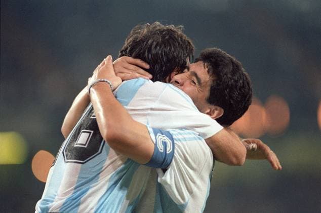 Naples, Italy. Argentine defender Jose Tiburcio Serrisuela and forward Diego Armando Maradona (L-R) rejoice after the group stage match of the 1990 FIFA World Cup, WM, Weltmeisterschaft, Fussball between the national teams of the Soviet Union and Argentina at the San Paolo stadium - 0:2. Igor Utkin TASS  1001839