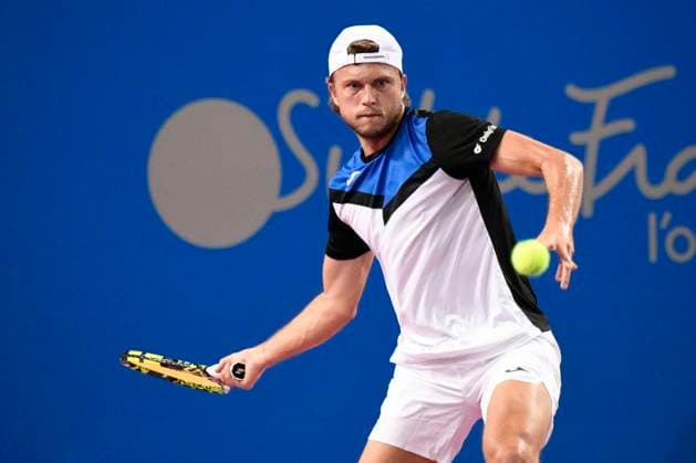 MONTPELLIER, FRANCE - JANUARY 31 : Alexandre MULLER (FRA) during the 2nd round of the ATP, Tennis Herren 250 Open Sud de France tournament vs. Michael MMOH (USA) in Montpellier, France on January 31st, 2024. TENNIS : Open Sud de France ATP 250 - 31 01 2024 ValentinaClaret Panoramic 