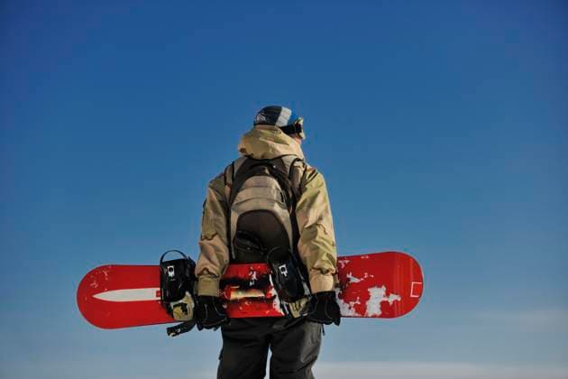snowboarder portrait snowboarder relaxing and posing at sunny day on winter season with blue sky in background (License=RF) 3726421 ,model released, Symbolfoto Copyright: xZoonar.com benisxarapovicx 3726421 ,model released, Symbolfoto ,property released
