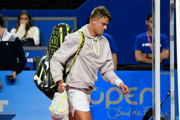 MONTPELLIER, FRANCE - FEBRUARY 3 : Holger RUNE (DEN) declares a medical withdrawal during the 1 2 final of the ATP, Tennis Herren 250 Open Sud de France tournament vs. Borna CORIC (CRO) in Montpellier, France on February 3rd, 2024. TENNIS : Open Sud de France ATP 250 - 03 02 2024 ValentinaClaret Panoramic 