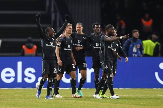 03.02.2024, xtgx, Fussball - 2.Bundesliga, Hertha BSC Berlin - Hamburger SV emspor, v.l. Hamburg jubel nach Tor durch mMiro Muheim (HSV, 28) (DFL DFB REGULATIONS PROHIBIT ANY USE OF PHOTOGRAPHS as IMAGE SEQUENCES and or QUASI-VIDEO) Berlin