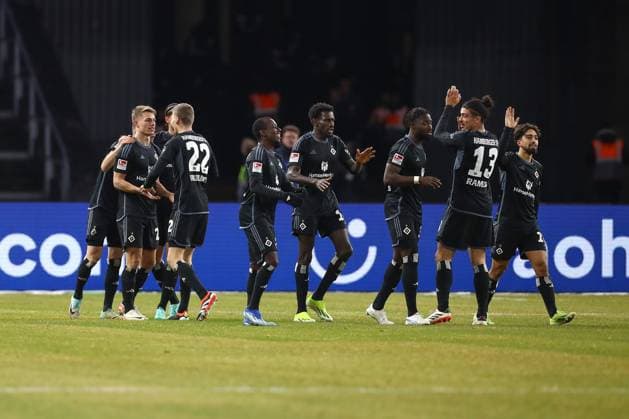 03.02.2024, xtgx, Fussball - 2.Bundesliga, Hertha BSC Berlin - Hamburger SV emspor, v.l. Hamburg jubel nach Tor durch mMiro Muheim (HSV, 28) (DFL DFB REGULATIONS PROHIBIT ANY USE OF PHOTOGRAPHS as IMAGE SEQUENCES and or QUASI-VIDEO) Berlin