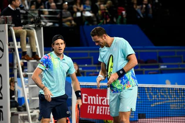 MONTPELLIER, FRANCE - FEBRUARY 4 : Albano OLIVETTI (FRA) and Sam WEISSBORN (AUT) during the doubles final of the ATP, Tennis Herren 250 Open Sud de France tournament vs. Sadio DOUMBIA (FRA) and Fabien REBOUL (FRA) in Montpellier, France on February 4th, 2024. TENNIS : Open Sud de France ATP 250 - 04 02 2024 ValentinaClaret Panoramic 