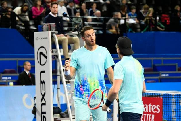 MONTPELLIER, FRANCE - FEBRUARY 4 : Albano OLIVETTI (FRA) and Sam WEISSBORN (AUT) during the doubles final of the ATP, Tennis Herren 250 Open Sud de France tournament vs. Sadio DOUMBIA (FRA) and Fabien REBOUL (FRA) in Montpellier, France on February 4th, 2024. TENNIS : Open Sud de France ATP 250 - 04 02 2024 ValentinaClaret Panoramic 