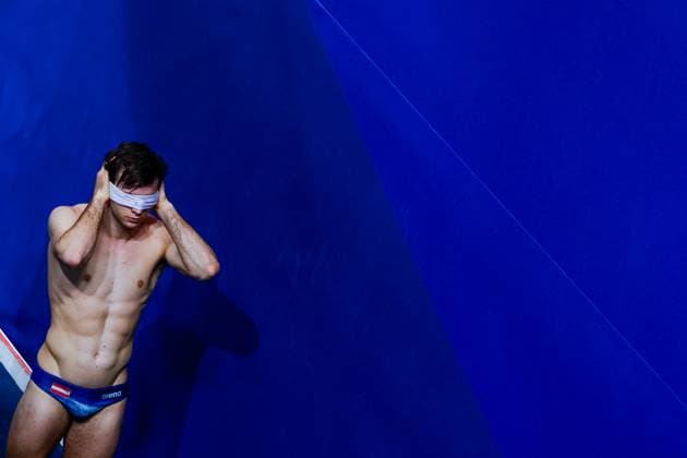 Sport Themen der Woche KW05 Sport Bilder des Tages SWIMMING - World Aquatics Championships 2024 DOHA,QATAR,04.FEB.24 - SWIMMING - World Aquatics Championships Doha 2024,diving, synchronized 3m springboard, men. Image shows Nikolaj Schaller (AUT.  GEPAxpictures xPhilippxBrem