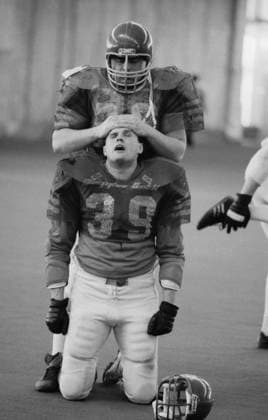 March 1-20, 1990. Moscow, USSR. Moscow team rugby player A. Biryukov (No.39, front) takes a rest during a break in the match between Moscow Bears and Krasnoyarsk Lions at the stadium of the Central Sports Club of the Army. The Moscow Bears team won with a score of 26:0. The exact date of the photograph is unknown. Igor Utkin TASS  18397045