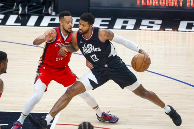 Sport Themen der Woche KW06 Sport Bilder des Tages February 7, 2024, Los Angeles, California, USA: Los Angeles Clippers Paul George 13 drives against New Orleans Pelicans CJ McCollum 3 during an NBA, Basketball Herren, USA basketball game at Crypto.com Arena, Wednesday, Feb. 7, 2024, in Los Angeles. Los Angeles USA - ZUMAc68_ 20240207_zaf_c68_027 Copyright: xRingoxChiux