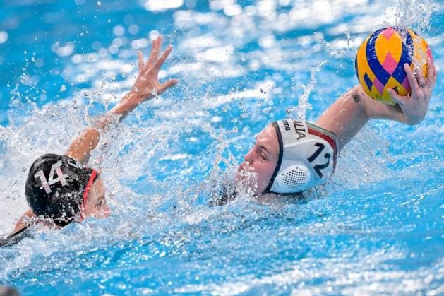 Marilia Mimides of Canada and Giulia Viacava of Italy during the Water polo, Wasserball women match between team Italy (white caps) and team Canada (blue caps) of the 21st World Aquatics Championships at the Aspire Dome in Doha (Qatar), February 8, 2024. GiorgioXScala