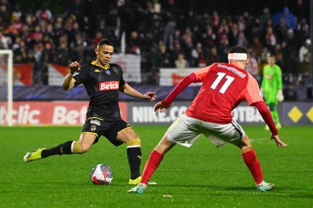 VANDERSON De Oliveira ( 2 - Monaco ) and Mion Mathieu ( 11 - Rouen ) during the French Cup match between FC Rouen Metropole and AS Monaco at Stade Robert Diochon on February 08, 2024 in Rouen, France. ( Photo by federico pestellini panoramic ) - FOOTBALL : Rouen vs Monaco - Coupe de France - 08 02 2024 FedericoPestellini Panoramic 