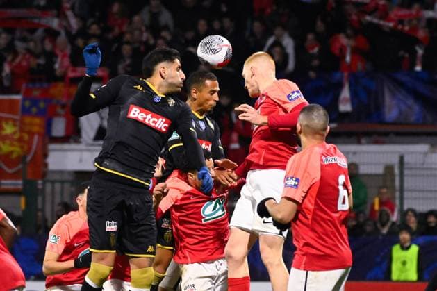 Guillermo MARIPAN ( 3 - Monaco ) and Sanson Valentin ( 5 - Rouen ) during the French Cup match between FC Rouen Metropole and AS Monaco at Stade Robert Diochon on February 08, 2024 in Rouen, France. ( Photo by federico pestellini panoramic ) - FOOTBALL : Rouen vs Monaco - Coupe de France - 08 02 2024 FedericoPestellini Panoramic 