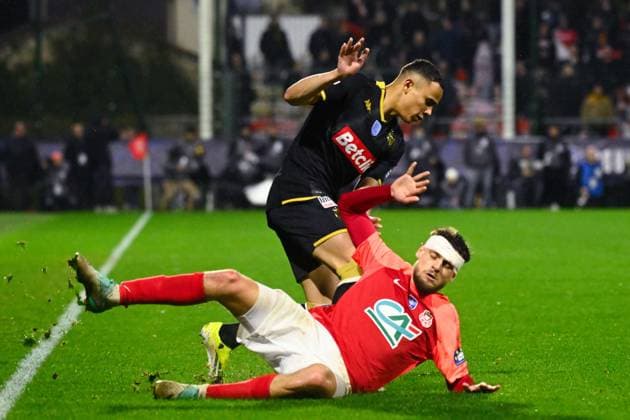 VANDERSON De Oliveira ( 2 - Monaco ) and Mion Mathieu ( 11 - Rouen ) during the French Cup match between FC Rouen Metropole and AS Monaco at Stade Robert Diochon on February 08, 2024 in Rouen, France. ( Photo by federico pestellini panoramic ) - FOOTBALL : Rouen vs Monaco - Coupe de France - 08 02 2024 FedericoPestellini Panoramic 