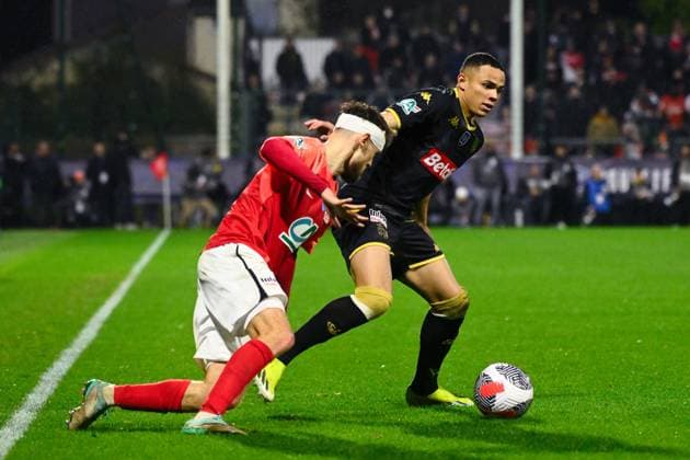 VANDERSON De Oliveira ( 2 - Monaco ) and Mion Mathieu ( 11 - Rouen ) during the French Cup match between FC Rouen Metropole and AS Monaco at Stade Robert Diochon on February 08, 2024 in Rouen, France. ( Photo by federico pestellini panoramic ) - FOOTBALL : Rouen vs Monaco - Coupe de France - 08 02 2024 FedericoPestellini Panoramic 