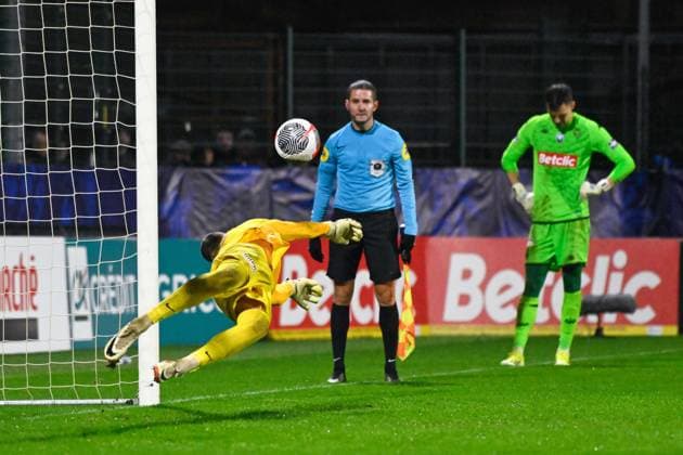 Aggoune Leonard ( 1 - Rouen ) stops last penalty during the French Cup match between FC Rouen Metropole and AS Monaco at Stade Robert Diochon on February 08, 2024 in Rouen, France. ( Photo by federico pestellini panoramic ) - FOOTBALL : Rouen vs Monaco - Coupe de France - 08 02 2024 FedericoPestellini Panoramic 