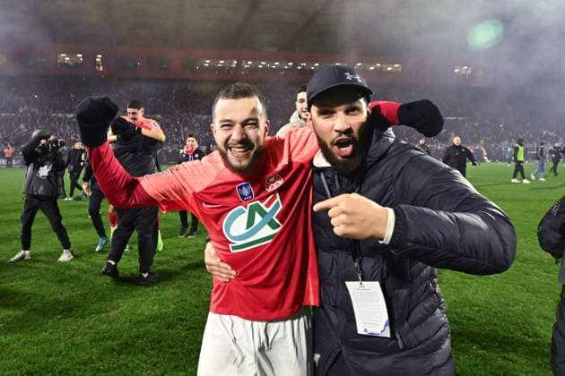 Bezzekhami Omar ( 13 - Rouen ) celebrates their side s victory after the French Cup match between FC Rouen Metropole and AS Monaco at Stade Robert Diochon on February 08, 2024 in Rouen, France. ( Photo by federico pestellini panoramic ) - FOOTBALL : Rouen vs Monaco - Coupe de France - 08 02 2024 FedericoPestellini Panoramic 