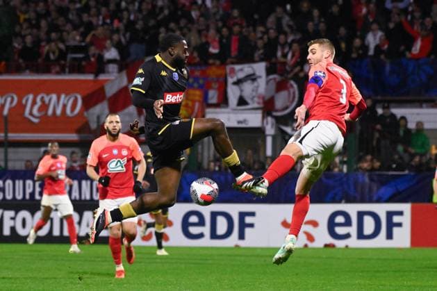 Fofana Youssouf ( 8 - Monaco ) and Bassin Clement ( 3 - Rouen ) during the French Cup match between FC Rouen Metropole and AS Monaco at Stade Robert Diochon on February 08, 2024 in Rouen, France. ( Photo by federico pestellini panoramic ) - FOOTBALL : Rouen vs Monaco - Coupe de France - 08 02 2024 FedericoPestellini Panoramic 