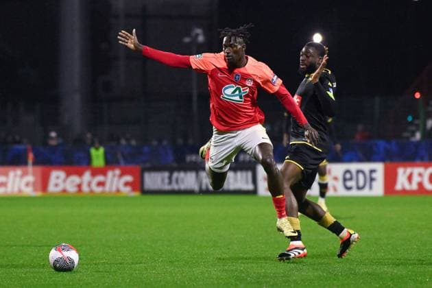 Damien Loppy ( 7 - Rouen ) and Fofana Youssouf ( 8 - Monaco ) during the French Cup match between FC Rouen Metropole and AS Monaco at Stade Robert Diochon on February 08, 2024 in Rouen, France. ( Photo by federico pestellini panoramic ) - FOOTBALL : Rouen vs Monaco - Coupe de France - 08 02 2024 FedericoPestellini Panoramic 