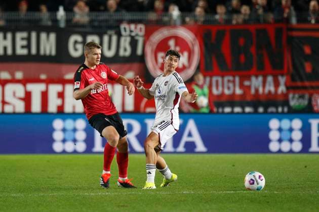 09.02.2024, xavx, Fussball 2.Bundesliga, SV Wehen Wiesbaden - 1.FC Nürnberg emspor, v.l. Florian Carstens (SV Wehen Wiesbaden), Taylan Duman (1.FC Nürnberg) (DFL DFB REGULATIONS PROHIBIT ANY USE OF PHOTOGRAPHS as IMAGE SEQUENCES and or QUASI-VIDEO) Wiesbaden
