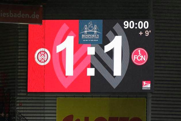 09.02.2024, xavx, Fussball 2.Bundesliga, SV Wehen Wiesbaden - 1.FC Nürnberg emspor, v.l. Anzeigetafel in der Brita Arena. Spielstand 1:1 Unentschieden. (DFL DFB REGULATIONS PROHIBIT ANY USE OF PHOTOGRAPHS as IMAGE SEQUENCES and or QUASI-VIDEO) Wiesbaden
