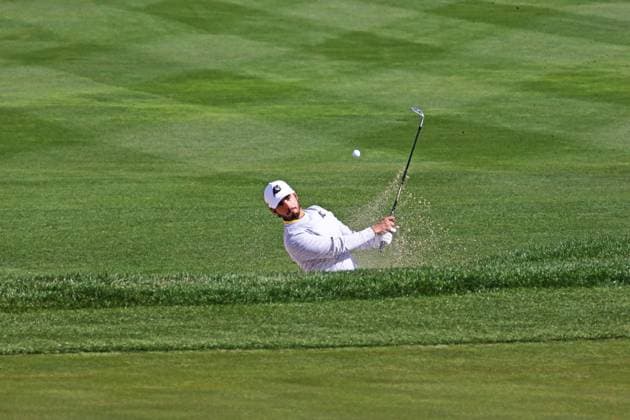 LAS VEGAS, NV - FEBRUARY 09: Abraham Ancer of Fireballs GC with a green side bunker shot during the LIV Golf League tournament on February 09, 2024 at the Las Vegas Country Club in Las Vegas, NV. (Photo by Matthew Bolt Icon Sportswire) GOLF: FEB 09 LIV Golf League Las Vegas EDITORIAL USE ONLY Icon240209192511