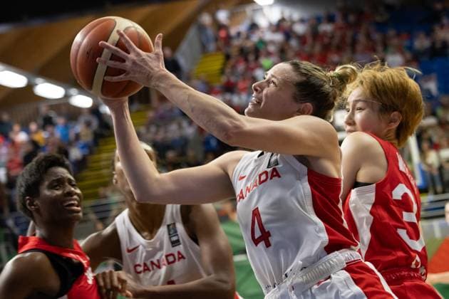 (240212) -- SOPRON, Feb. 12, 2024 -- Sami Hill (2nd R) of Canada goes to basket during the match between Canada and Japan at the FIBA Women s Olympic qualifying tournament in Sopron, Hungary on Feb. 11, 2024. (Photo by Xinhua) (SP) HUNGARY-SOPRON-BASKETBALL-FIBA WOMEN S OLYMPIC QUALIFIERS-CANADA VS JAPAN AttilaxVolgyi 