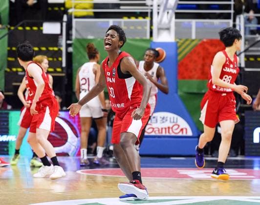 Basketball: Olympic women s qualifier Japan s Evelyn Mawuli (C) reacts after scoring a three-pointer during the fourth quarter of an Olympic women s basketball qualifier against Canada on Feb. 11, 2024, in Sopron, Hungary.  A14AA0002454917P