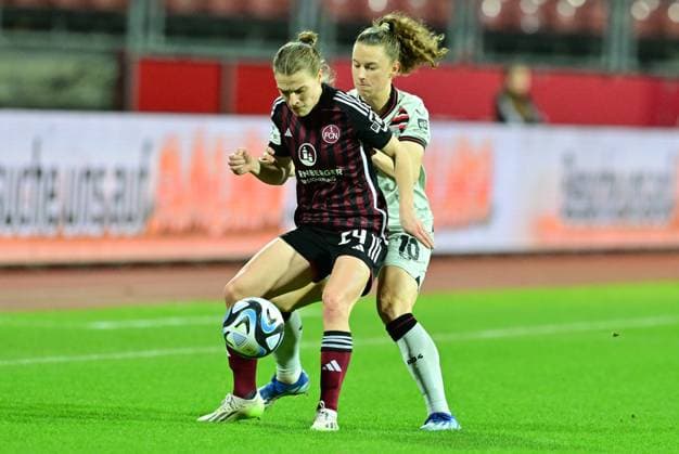 12.02.2024 - Fussball - Saison 2023 2024 - 1. Frauen - Fussball - Bundesliga - 13. Spieltag: 1. FC Nürnberg FCN ( Club ) - Bayern 04 Leverkusen - Sportfoto Zink - xwoxzix - Nastassja Lein (24, 1. FC Nürnberg FCN ) Synne Skinnes Hansen (10, Bayer Leverkusen )