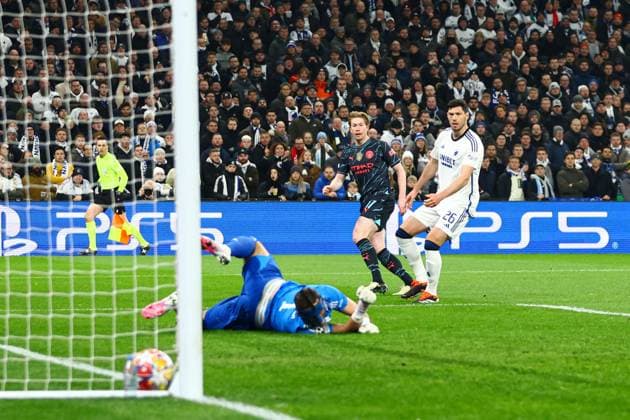 Kevin De Bruyne of Manchester City scores for their side to make it 1-0 FC Copenhagen v Manchester City, UEFA Champions League, Round of 16, First Leg, Football, Parken Stadium, Copenhagen, Denmark - 13 Feb 2024 EDITORIAL USE ONLY No use with unauthorised audio, video, data, fixture lists, club league logos or live services. Online in-match use limited to 120 images, no video emulation. No use in betting, games or single club league player publications.  Copyright: xKieranxMcManus Shutterstockx 14343227ab