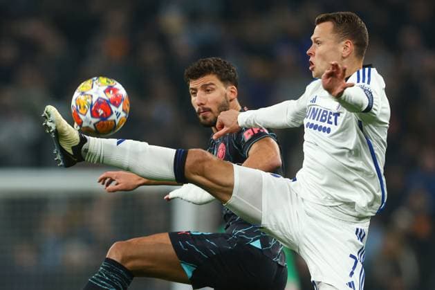 Ruben Dias of Manchester City battles with Viktor Claesson of F.C. Copenhagen FC Copenhagen v Manchester City, UEFA Champions League, Round of 16, First Leg, Football, Parken Stadium, Copenhagen, Denmark - 13 Feb 2024 EDITORIAL USE ONLY No use with unauthorised audio, video, data, fixture lists, club league logos or live services. Online in-match use limited to 120 images, no video emulation. No use in betting, games or single club league player publications.  Copyright: xKieranxMcManus Shutterstockx 14343227ah