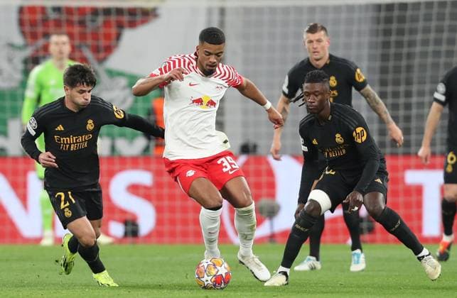 13.02.2024, xtgx, Fussball UEFA Champions League 1 8 Finale, RB Leipzig - Real Madrid emspor, v.l. Brahim Diaz (Real Madrid), Benjamin Henrichs (RB Leipzig), Alvaro Odriozola (Real Madrid) (DFL DFB REGULATIONS PROHIBIT ANY USE OF PHOTOGRAPHS as IMAGE SEQUENCES and or QUASI-VIDEO) Leipzig
