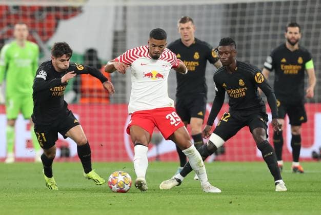 13.02.2024, xtgx, Fussball UEFA Champions League 1 8 Finale, RB Leipzig - Real Madrid emspor, v.l. Brahim Diaz (Real Madrid), Benjamin Henrichs (RB Leipzig), Alvaro Odriozola (Real Madrid) (DFL DFB REGULATIONS PROHIBIT ANY USE OF PHOTOGRAPHS as IMAGE SEQUENCES and or QUASI-VIDEO) Leipzig