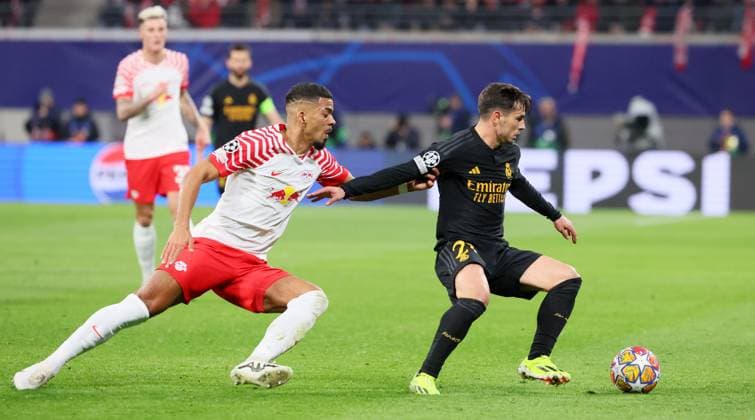 RB Leipzig - Real Madrid Champions League Leipzig, 13.02.2024, Red Bull Arena, Fussball, UEFA Champions League, Achtelfinale , RB Leipzig vs. Real Madrid , Im Bild von links: Benjamin Henrichs (39, RB Leipzig), Brahim Diaz (21, Real). , Only editorial use. , UEFA regulations prohibit any use of photographs as image sequences and or quasi-video ,