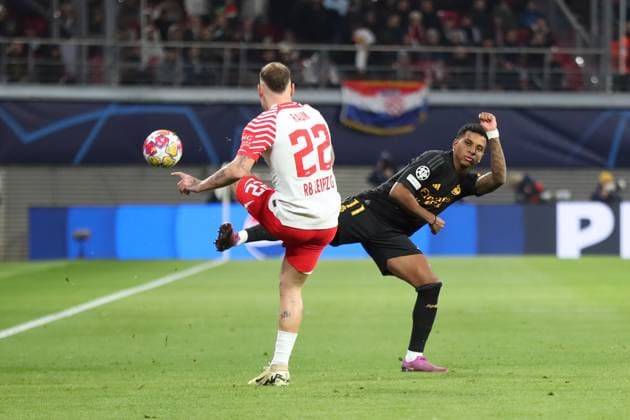 Champions League, Achtelfinale: RB Leipzig vs. Real Madrid, 13.02.24 Rodrygo (11, Real Madrid) gegen David Raum (22, RB Leipzig). Fussball, UEFA Champions League, Saison 2023 2024, Achtelfinale: RB Leipzig vs. Real Madrid am 13.02.24 in der Red Bull Arena, Leipzig. Copyright: xBEAUTIFULxSPORTS JanxKaeferx