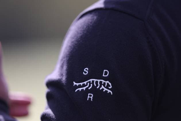 February 13, 2024, Pacific Palisades, California, USA: LOREN REID, TIGER WOODS private security detail is outfitted in Sun Day Red apparel during a Tuesday practice round of the The Genesis Invitational in Pacific Palisades, California Pacific Palisades USA - ZUMAt158 20240213_zsp_t158_009 Copyright: xBrentonxTsex