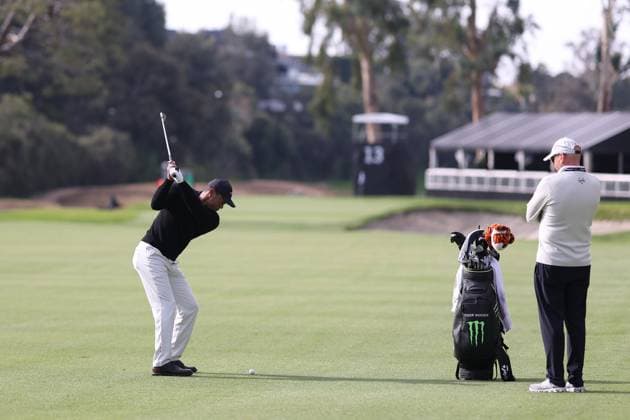 February 13, 2024, Pacific Palisades, California, USA: TIGER WOODS plays a shot from the 13th fairway during a Tuesday practice round of the The Genesis Invitational in Pacific Palisades, California Pacific Palisades USA - ZUMAt158 20240213_zsp_t158_012 Copyright: xBrentonxTsex
