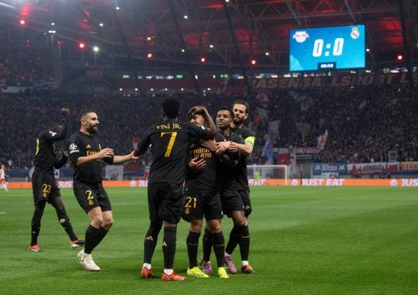 Fussball, Herren, Saison 2023 2024, UEFA Champions League (Achtelfinale, Hinspiel), RB Leipzig - Real Madrid, v. l. Ferland Mendy, Dani Carvajal, Vinicius Junior, Brahim Diaz (alle Madrid), Jubel nach dem Tor zum 1:0, 13.02. 2024, Copyright: xSebastianxRäppold MatthiasxKochx