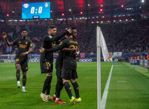 Fussball, Herren, Saison 2023 2024, UEFA Champions League (Achtelfinale, Hinspiel), RB Leipzig - Real Madrid, v. l. Aurelien Tchouameni, Federico Valverde, Brahim Diaz, Vinicius Junior (alle Madrid), Jubel nach dem Tor zum 1:0, 13.02. 2024, Copyright: xSebastianxRäppold MatthiasxKochx