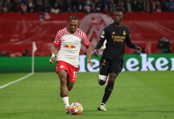 13.02.2024, xgox, Fussball UEFA Champions League 1 8 Finale, RB Leipzig - Real Madrid emspor, v.l. Lois Openda (RB Leipzig), Eduardo Camavinga (Real Madrid) (DFL DFB REGULATIONS PROHIBIT ANY USE OF PHOTOGRAPHS as IMAGE SEQUENCES and or QUASI-VIDEO) Leipzig