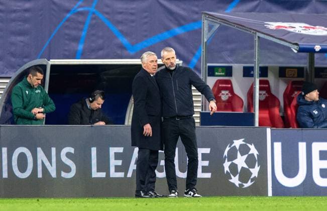 Fussball, Herren, Saison 2023 2024, UEFA Champions League (Achtelfinale, Hinspiel), RB Leipzig - Real Madrid, v. l. die Trainer Marco Rose (RB) und Carlo Ancelotti (Madrid), 13.02. 2024, Copyright: xSebastianxRäppold MatthiasxKochx