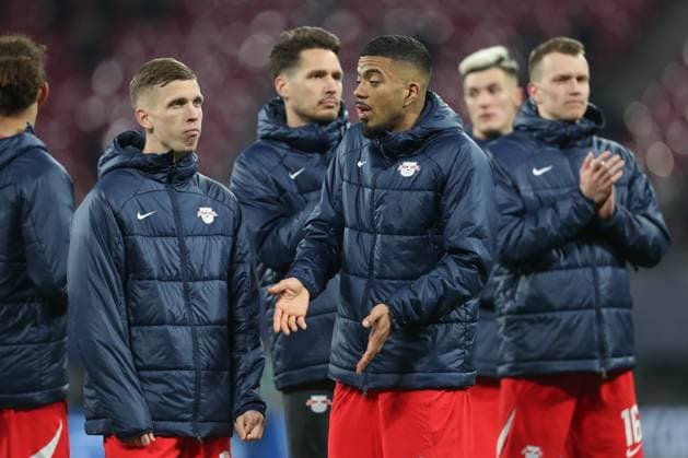 13.02.2024, xtgx, Fussball UEFA Champions League 1 8 Finale, RB Leipzig - Real Madrid emspor, v.l. Dani Olmo (Leipzig, 7), Benjamin Henrichs (Leipzig, 39) enttaeuscht, schaut enttaeuscht, niedergeschlagen, disappointed (DFL DFB REGULATIONS PROHIBIT ANY USE OF PHOTOGRAPHS as IMAGE SEQUENCES and or QUASI-VIDEO) Leipzig
