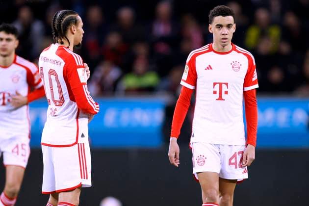 MUSIALA Jamal Team FC Bayern Muenchen mit SANE DFL Bundesliga Saison 2023 - 2024 Bundesliga Spiel Bayer 04 Leverkusen - FC Bayern 3 : 0 am 10. 02. 2024 in Leverkusen DFL REGULATIONS PROHIBIT ANY USE OF PHOTOGRAPHS as IMAGE SEQUENCES and or QUASI-VIDEO Copyright: xLacixPerenyix