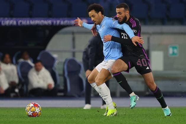 UEFA CHAMPIONS LEAGUE 2023-2024 - Round 16 - SS Lazio vs Bayern Munchen, Olympic Stadium in Rome Rome, Italy 14.2.2024: Felipe Anderson of Lazio , Noussair Mazraoui of Bayern Munchen in action during the Uefa Champions League 2023-2024, round of 16 football match SS Lazio vs FC Bayern Mucnhen at Olympic Stadium in Rome. Rome Olympic italy italy Copyright: xmarcoxiacobucci