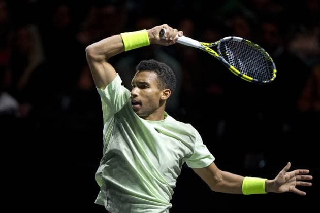 ROTTERDAM - Felix Auger-Aliassime (CAN) in action against Andrey Rublev (RUS) on the third day of the ABN AMRO Open tennis tournament in Ahoy. ANP SANDER KONING Third day 2024 xVIxANPxSportx xxANPxIVx 491128149 originalFilename: 491128149.jpg
